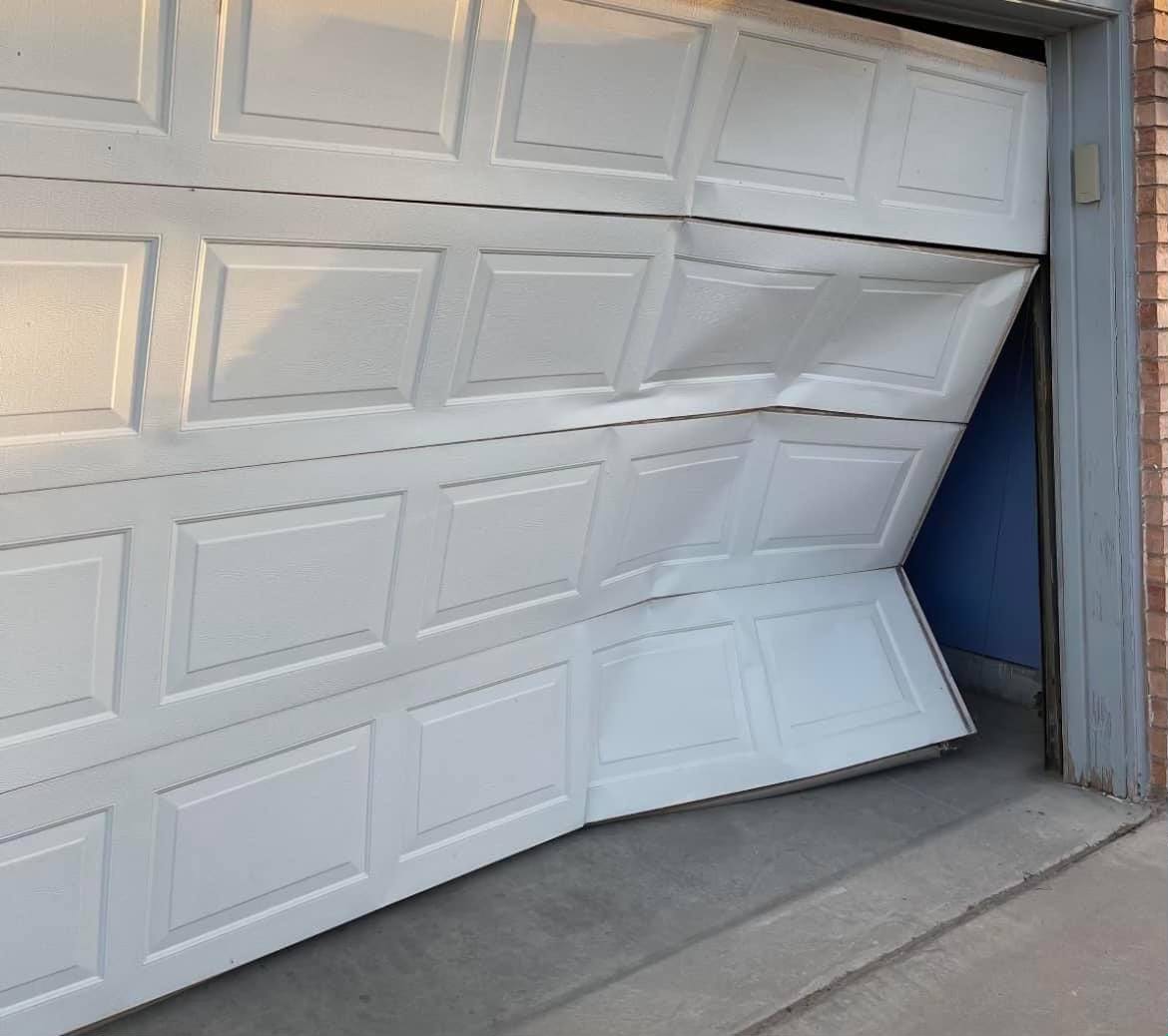 Damaged Garage Door In El Paso, TX
